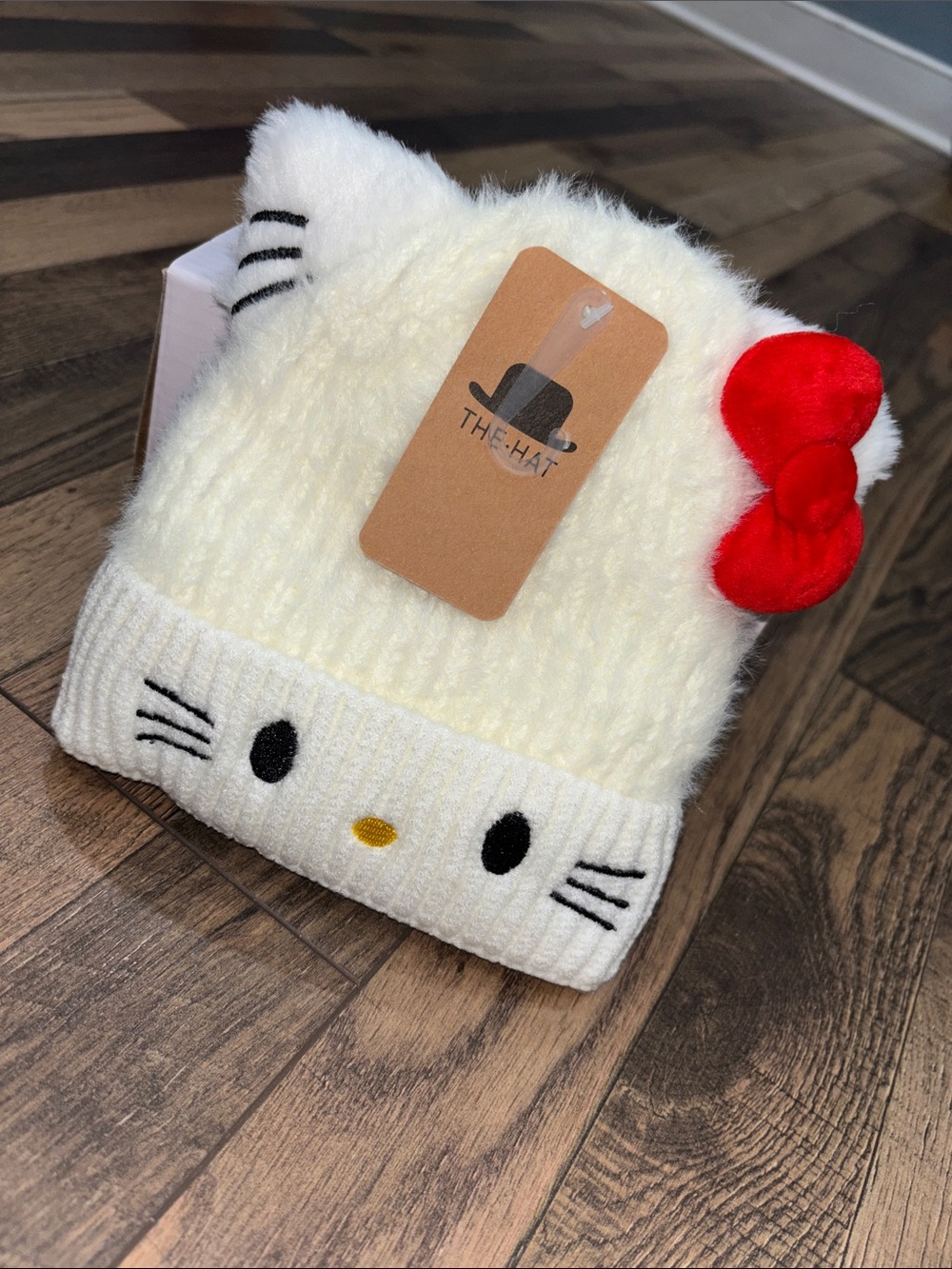 Kids Cream Fleece Lined Hello Kitty Beanie with Red Bow